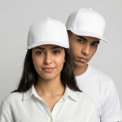 Two people wearing white baseball caps against a plain background